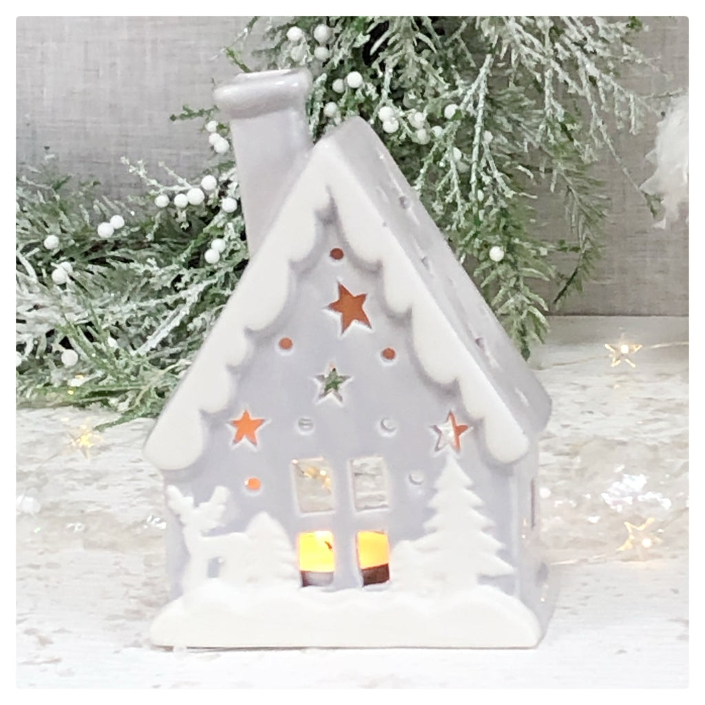 Snowy house candle holder