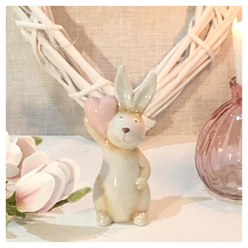 Ceramic bunny holding heart